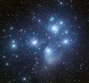 The open star cluster known as the Pleiades or "The Seven Sisters"